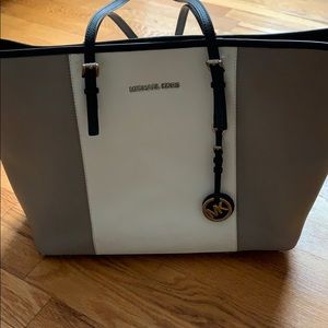Grey and white Michael Kors tote